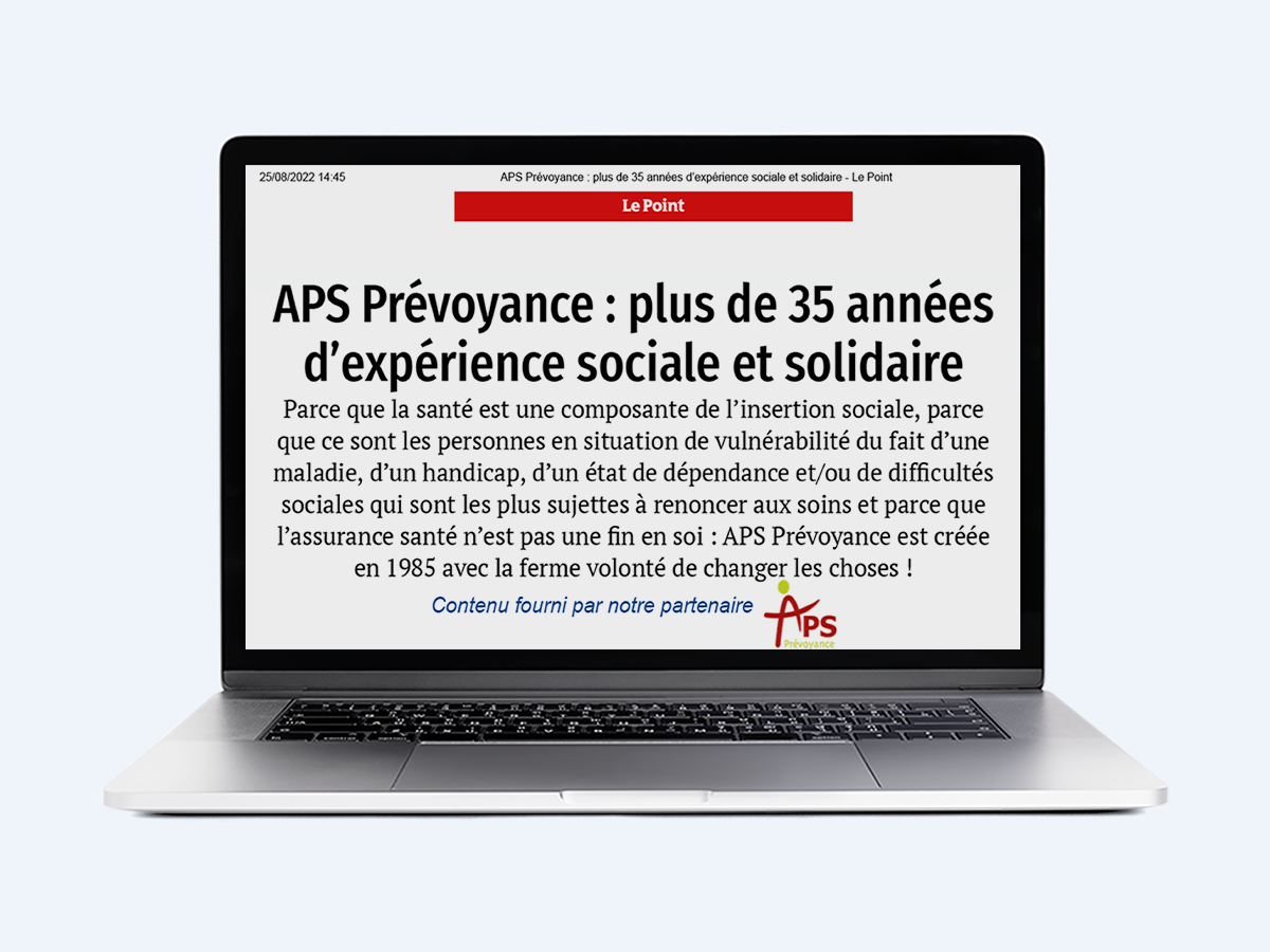 Ordinateur avec article du Point